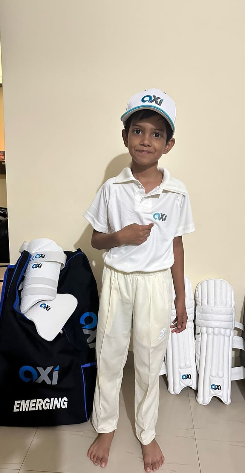 Junior cricketer training in the nets at Axi Academy, Sarjapur
