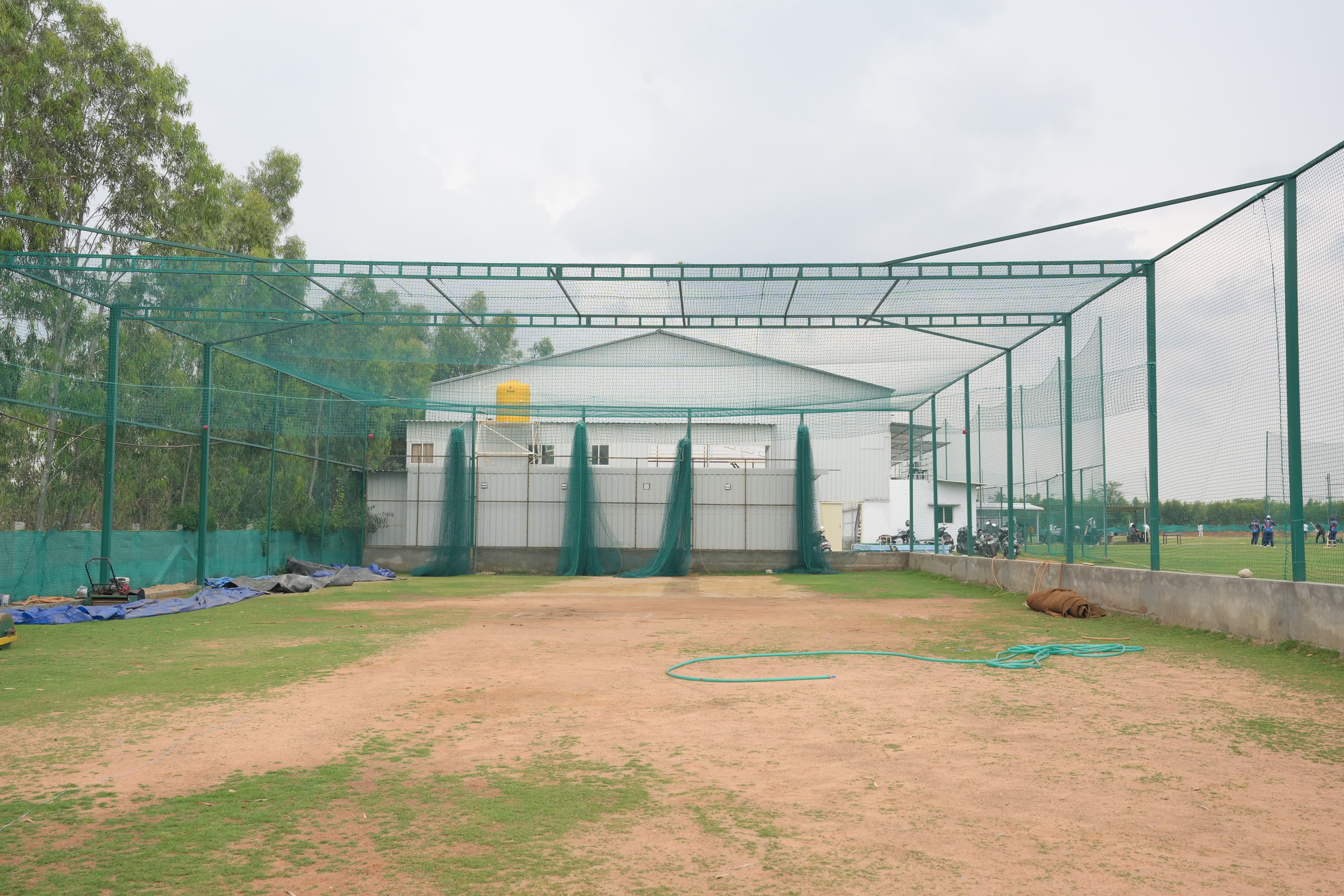 Open cricket practice nets at Axi Cricket Park, Sarjapur